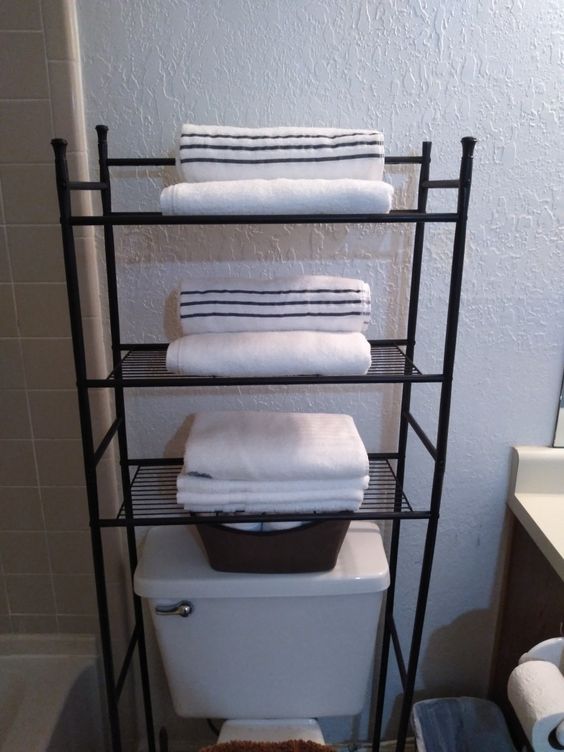 https://www.thetechedvocate.org/wp-content/uploads/2023/10/11-Simple-Ways-to-Roll-Towels-for-Storage.jpg